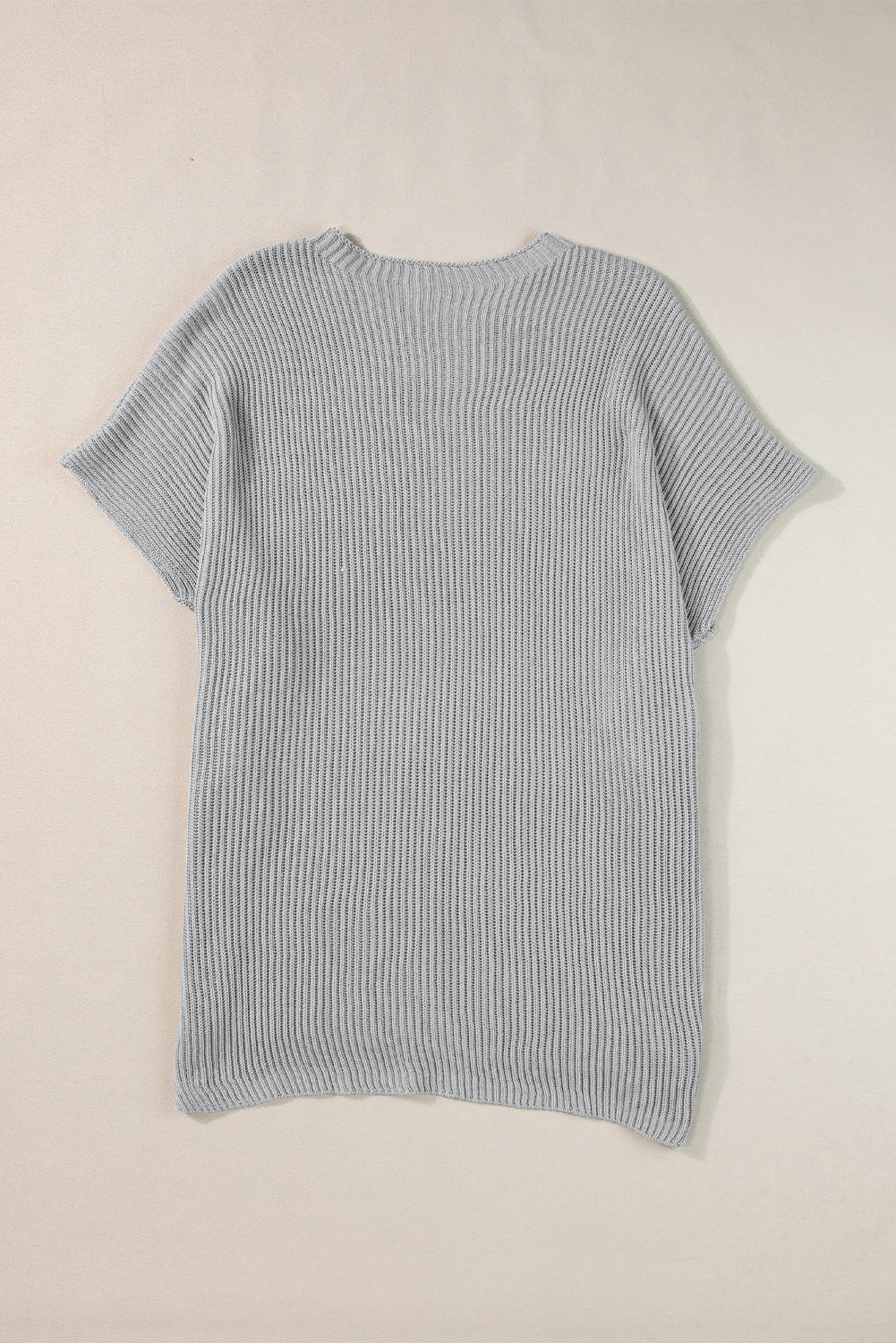 Apricot Side Slit Short Sleeve Oversized SweaterMaterial:55%Acrylic+45%Cotton



		The sweater is a comfortable and chic addition to your wardrobe. Made from breathable, lightweight, and stretchy knitted fabric,