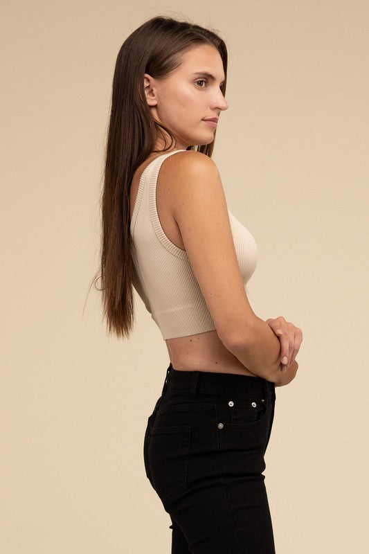 Ribbed Seamless Crop TopElevate your summer essentials with our Ribbed Seamless Crop Top, a versatile piece perfect for layering or wearing solo. Crafted with comfort in mind, it boasts a f