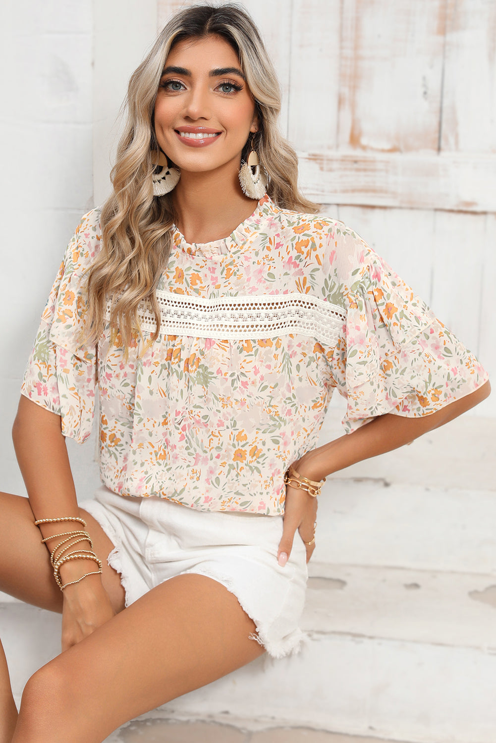 Multicolor Floral Print Wide Batwing Sleeves BlouseMaterial:100%Polyester



		The round neck design gives a classic touch to the blouse
	
	
		Wide ruffle sleeves make a statement and add volume
	
	
		Lace sp