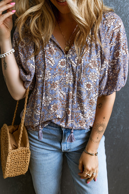 Purple Boho Floral Tassel Tie Split Neck Bubble Sleeve BlouseMaterial:100%Viscose

• Vibrant purple hue and intricate floral patterns add a whimsical touch to this blouse, perfect for adding a pop of color to any outfit.
• B