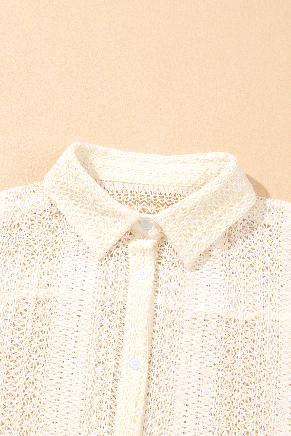 Beige Lace Crochet Collared Button Up Oversized ShirtMaterial:85%Cotton+15%Polyester

• Effortlessly elegant, the shirt exudes bohemian charm with its intricate crochet lace detailing.
• Its oversized fit offers comf