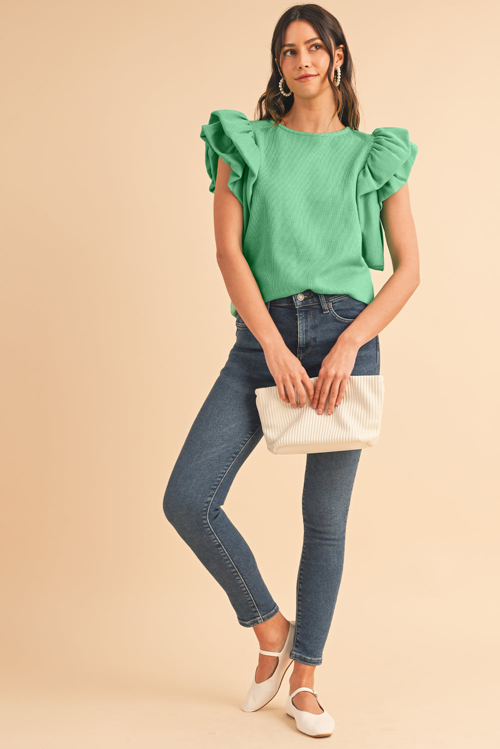 Green Solid Color Ruffle Sleeve Ribbed BlouseMaterial:65%cotton+33%polyester+2%Elastane



		The blouse features ruffle sleeves, which add a playful and romantic touch to the overall design. 
	
	
		The sol