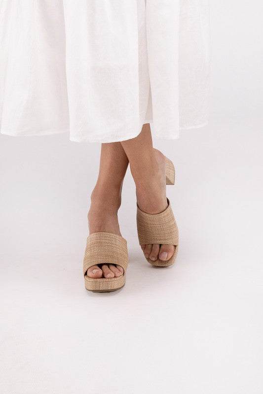 ZAFER-Nat MulesIntroducing the Zafer-Nat Mules, a fusion of style and comfort designed to elevate your summer wardrobe. These sandals feature a minimalist yet sophisticated design,