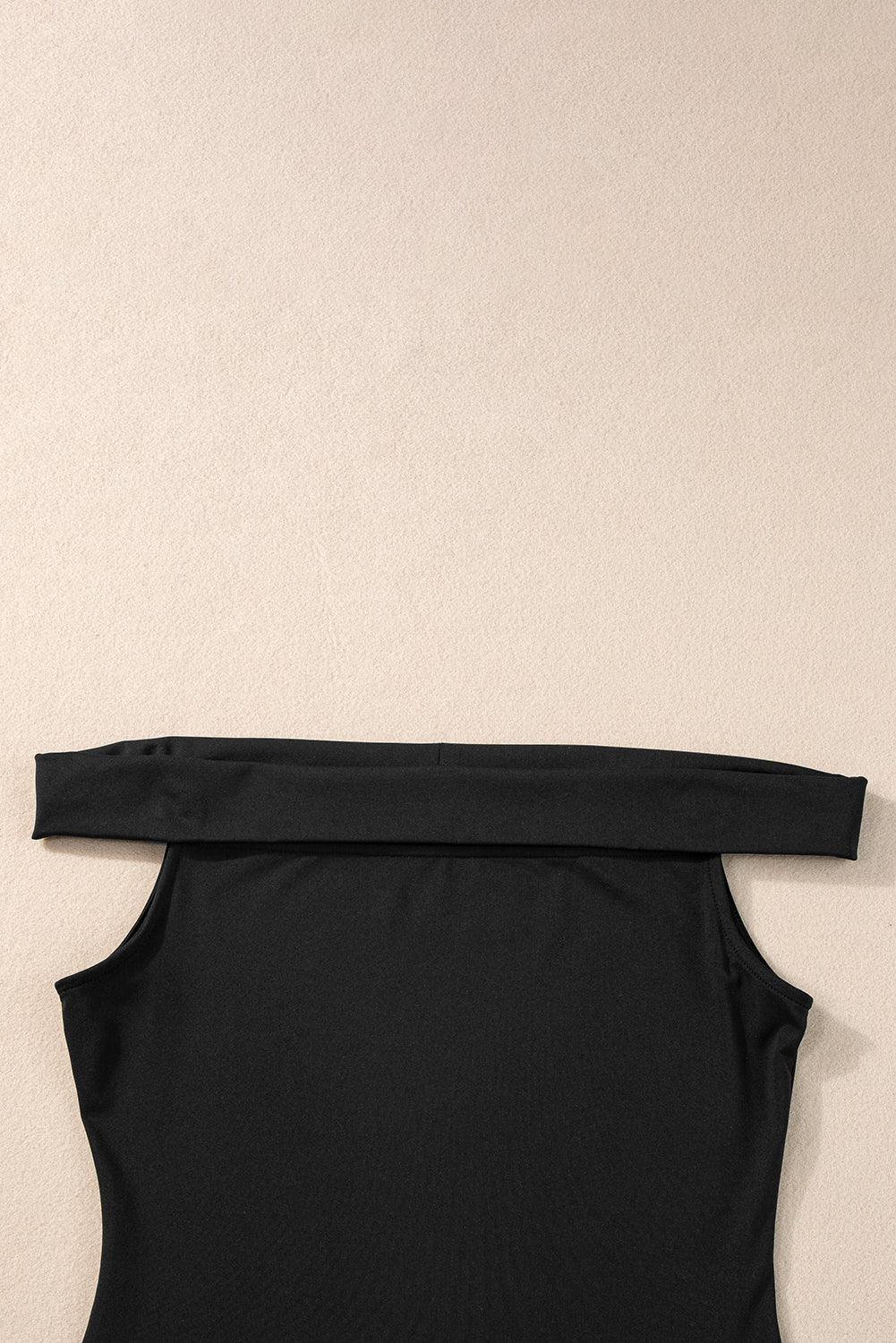 Black Solid Color Folded Off Shoulder Slim BlouseMaterial:92%Polyester+8%Elastane



		This trendy and flattering slim top is crafted to provide a fashionable and modern look, making it a versatile choice for var