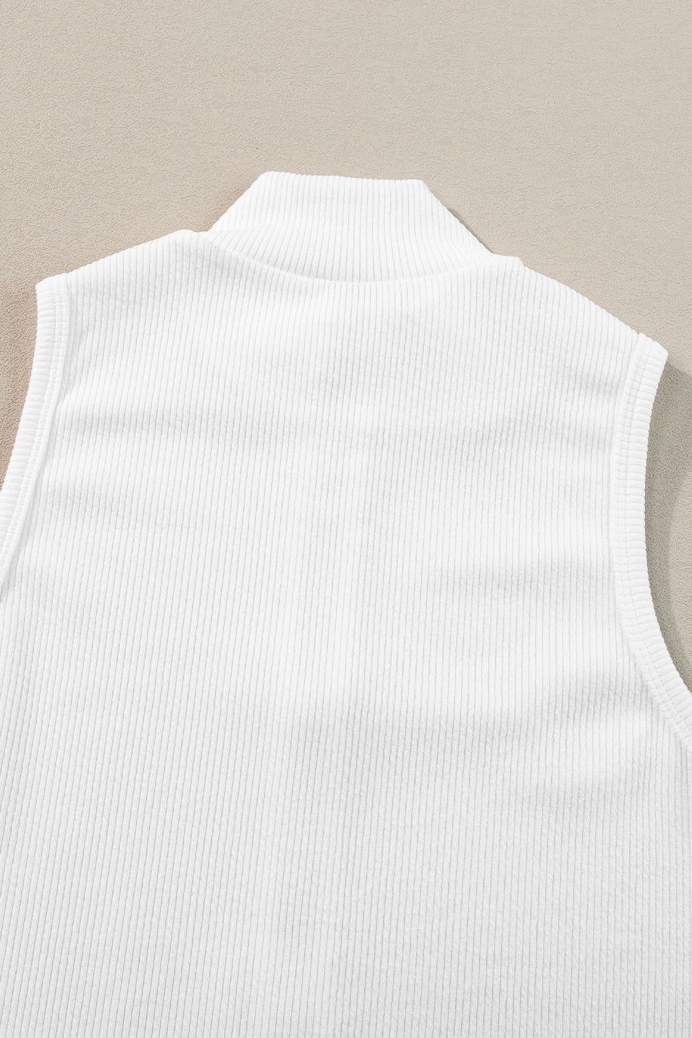 White Zip Up Mock Neck Ribbed Sleeveless BodysuitMaterial:95%Polyester+5%Elastane



		The zip-up feature of this chic bodysuit provides convenient on and off access. 
	
	
		Adding a touch of sophistication an