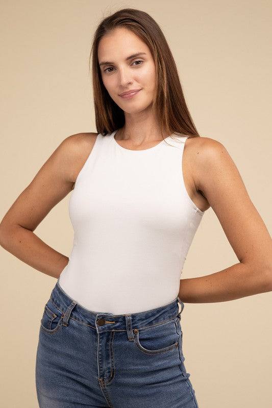 Boat Neck Sleeveless Padded BodysuitThe Boat Neck Sleeveless Padded Bodysuit offers both style and comfort. With its boat neckline and sleeveless design, it provides a sleek and elegant look. The padde