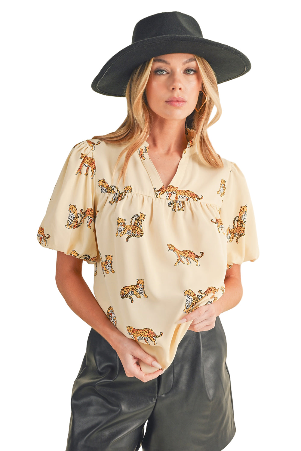 Apricot Animal Print V Neck Puff Sleeve BlouseMaterial:100%Polyester



		The blouse features an animal print pattern, which adds a bold and eye-catching element to the design. 
	
	
		Animal prints, such as