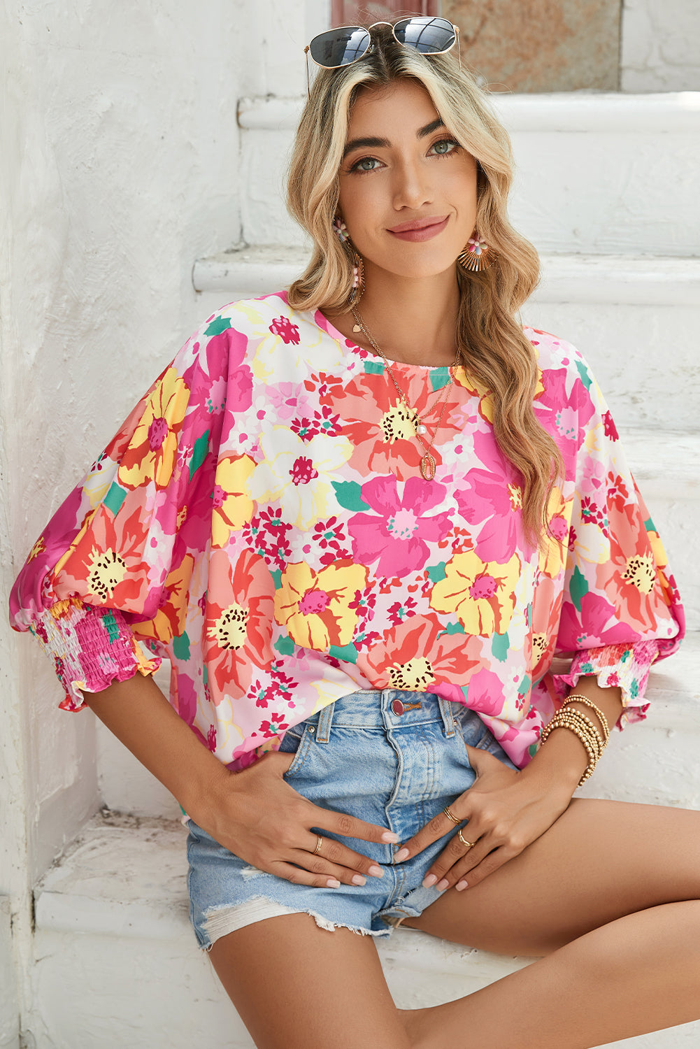 Pink Shirred Cuffs 3/4 Sleeve Boho Floral BlouseMaterial:100%Polyester



		The blouse is a stylish and feminine top featuring shirred cuffs and a boho-inspired floral print, adding a touch of bohemian charm to 