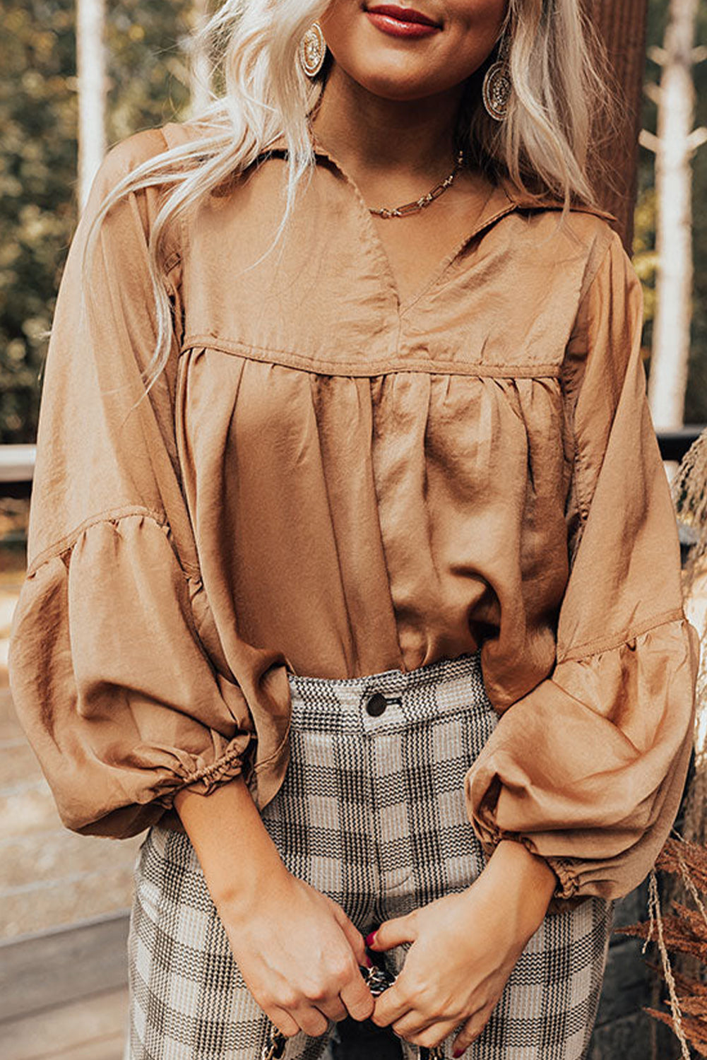 Brown Solid Color Lantern Sleeve Collared Boho TopMaterial:100%Polyester



		Made from high-quality materials for durability and comfort.
	
	
		It features 3/4 lantern sleeves and a collared neckline.
	
	
	