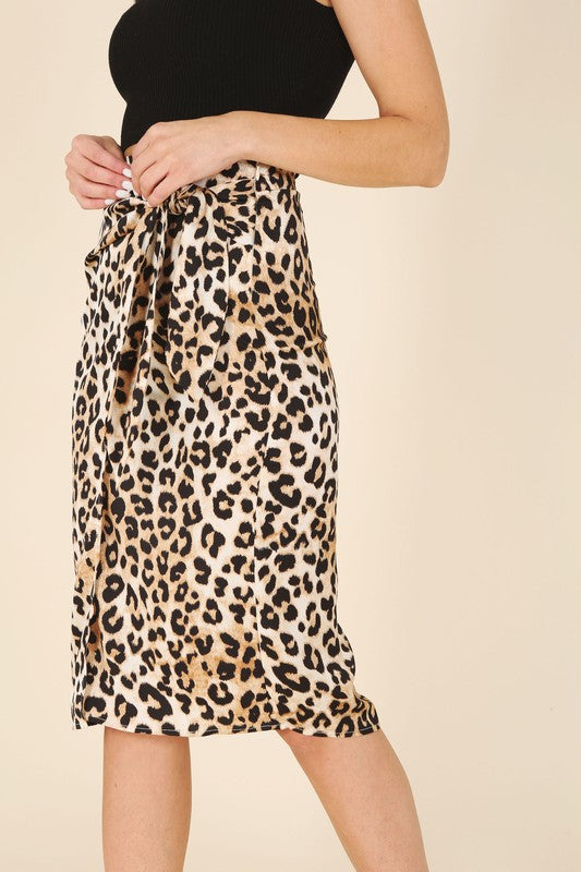 Satin leopard tie skirt- Satin leopard tie skirt- Pattern type : leopard pattern- Stretch : no stretch- Sheer : not lined, but not sheer - Care instruction : machine wash cold, only non-ch