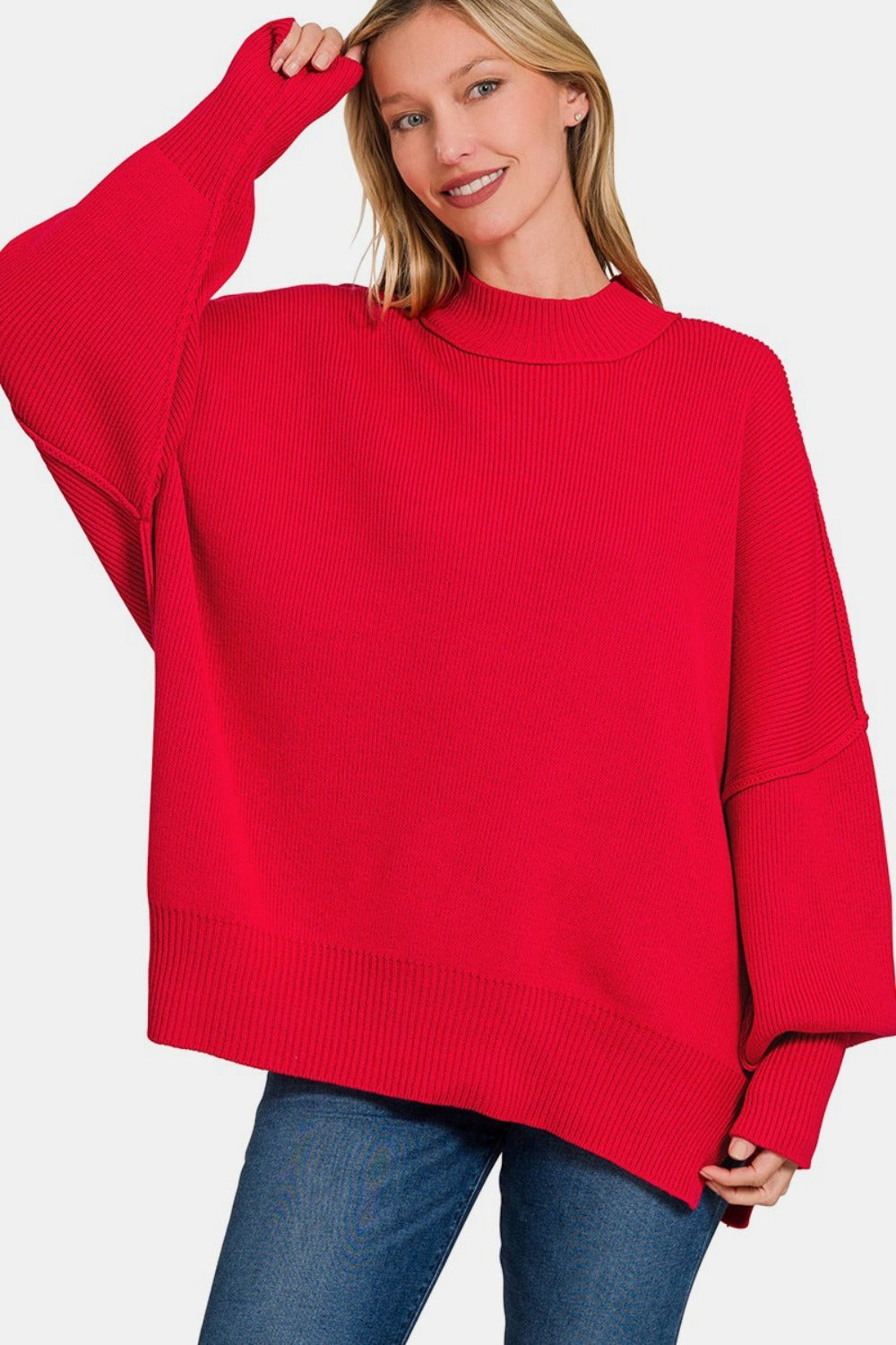 Zenana Side Sit Oversize SweaterSide Slit Oversize Sweater is a trendy and comfortable choice for your casual wardrobe. The oversized fit adds a relaxed and effortless vibe to your outfit. With sid