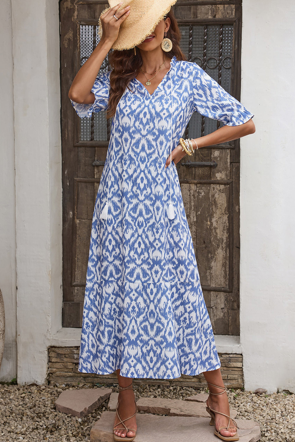 Sky Blue Geometric Print Casual V Neck Maxi DressMaterial:100%Polyester



		•Gorgeous and stylish dress in elegant blue with ruffle trim.
	
	
		•Features a split v-neck and a half-sleeve design that adds some