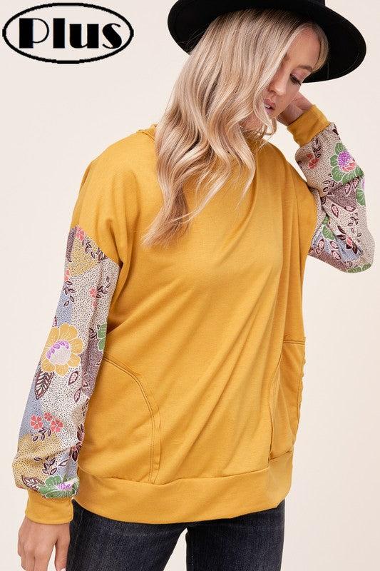 PLUS WOVEN FLORAL MIXED TOPFRENCH TERRY SOLID AND WOVEN FLORAL PRINT MIXED LONG SLEEVE SIDE POCKET RAW EDGE DETAIL PLUS TOP 
Style: Casual
Print / Pattern: SOLID AND WOVEN FLORAL 
Fit: Regular