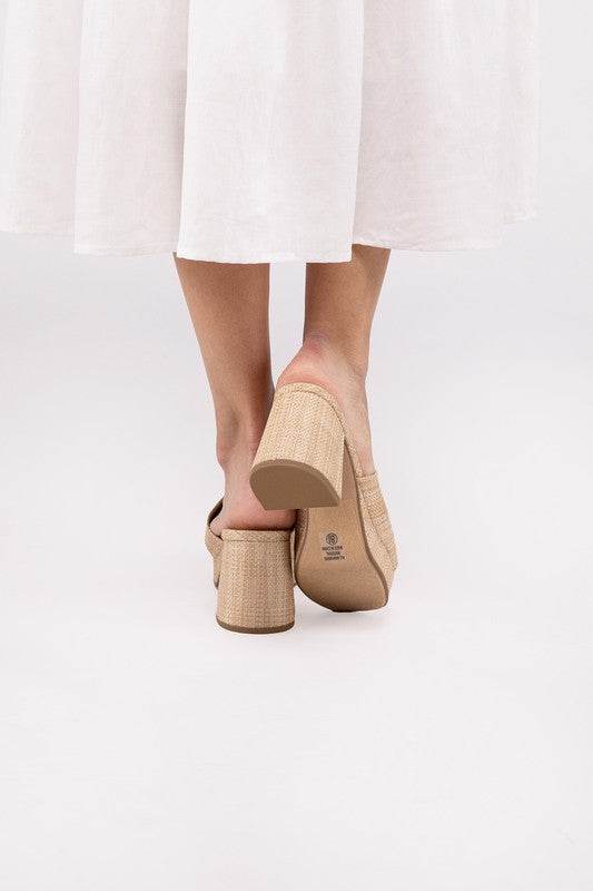 ZAFER-Nat MulesIntroducing the Zafer-Nat Mules, a fusion of style and comfort designed to elevate your summer wardrobe. These sandals feature a minimalist yet sophisticated design,