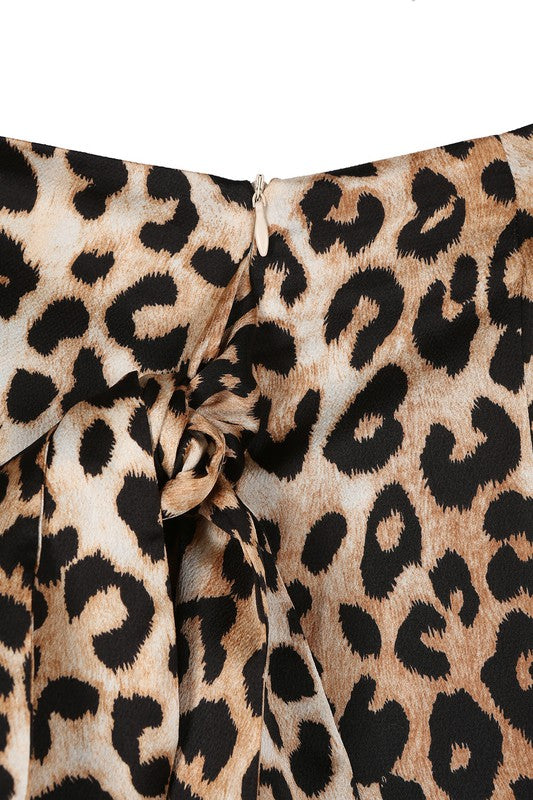 Satin leopard tie skirt- Satin leopard tie skirt- Pattern type : leopard pattern- Stretch : no stretch- Sheer : not lined, but not sheer - Care instruction : machine wash cold, only non-ch