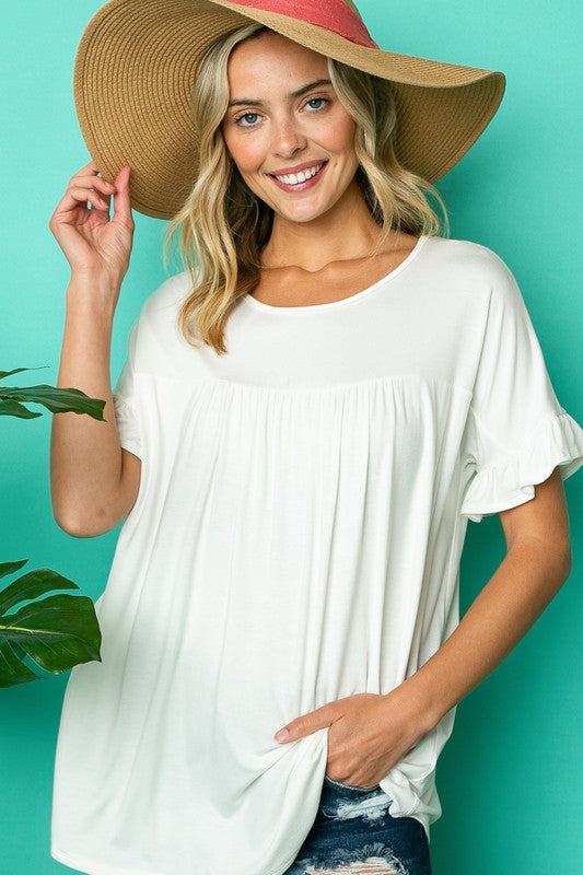 PLUS SOLID RUFFLED SL BABY DOLL TOPPLUS SOLID JERSEY ROUND NECK RUFFLED SHORT SLEEVE BABY DOLL TOP95% RAYON, 5% SPANDEX MADE IN USA1X/2X/3X 2-2-2
Style: Casual
Print / Pattern: SOLID
Fit: Loose
Neck L