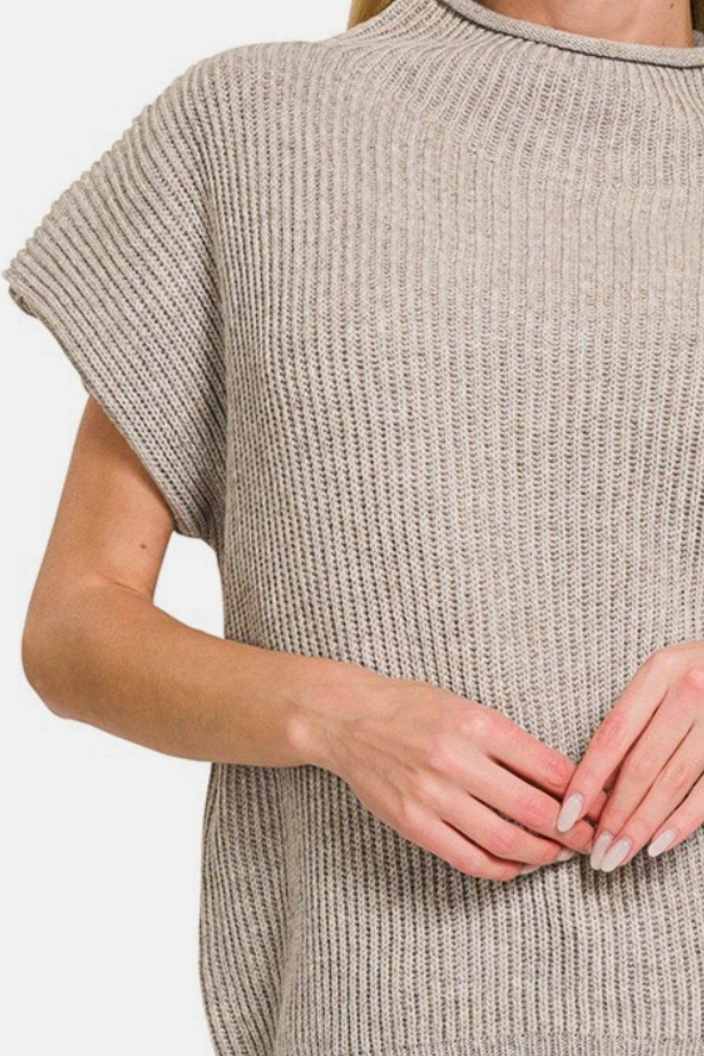 Zenana Short Sleeve Mock Neck SweaterStay effortlessly stylish with this Short Sleeve Mock Neck Sweater. The mock neck design adds a touch of sophistication, making it perfect for both casual and dressi