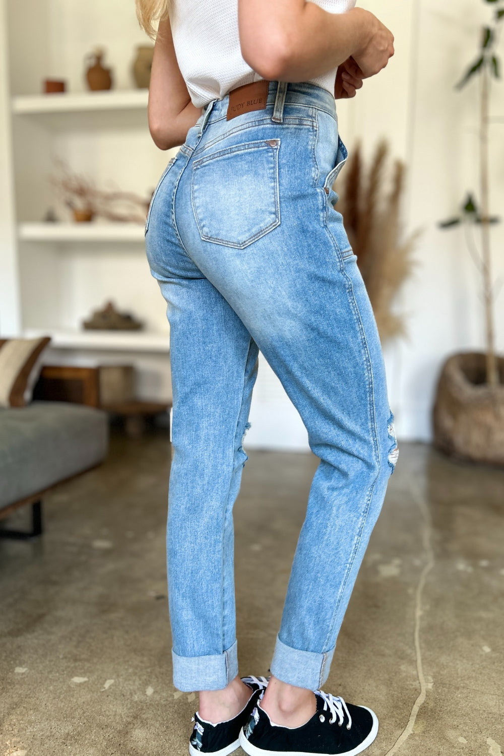 Judy Blue Full Size Distressed Straight Jeans with Patch PocketsThese distressed straight jeans feature stylish patch pockets for added flair. The distressed detailing adds a trendy touch to your look. The straight cut offers a f