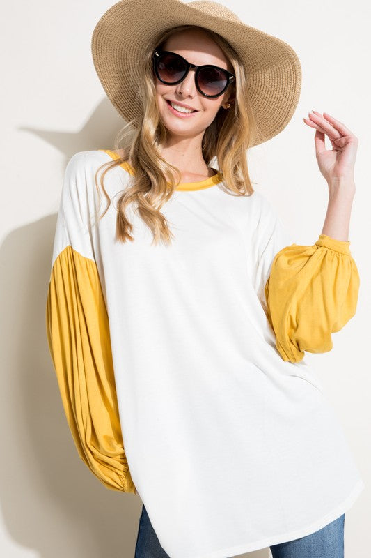 COLOR BLOCK VOLUME PUFF SLEEVE TOPSOLID JERSEY COLOR BLOCK VOLUMED PUFF LONG SLEEVE ROUND NECK TOP95% RAYON, 5% SPANDEX MADE IN USAS/M/L 2-2-2
Style: Casual
Print / Pattern: SOLID
Fit: Loose
Neck Lin