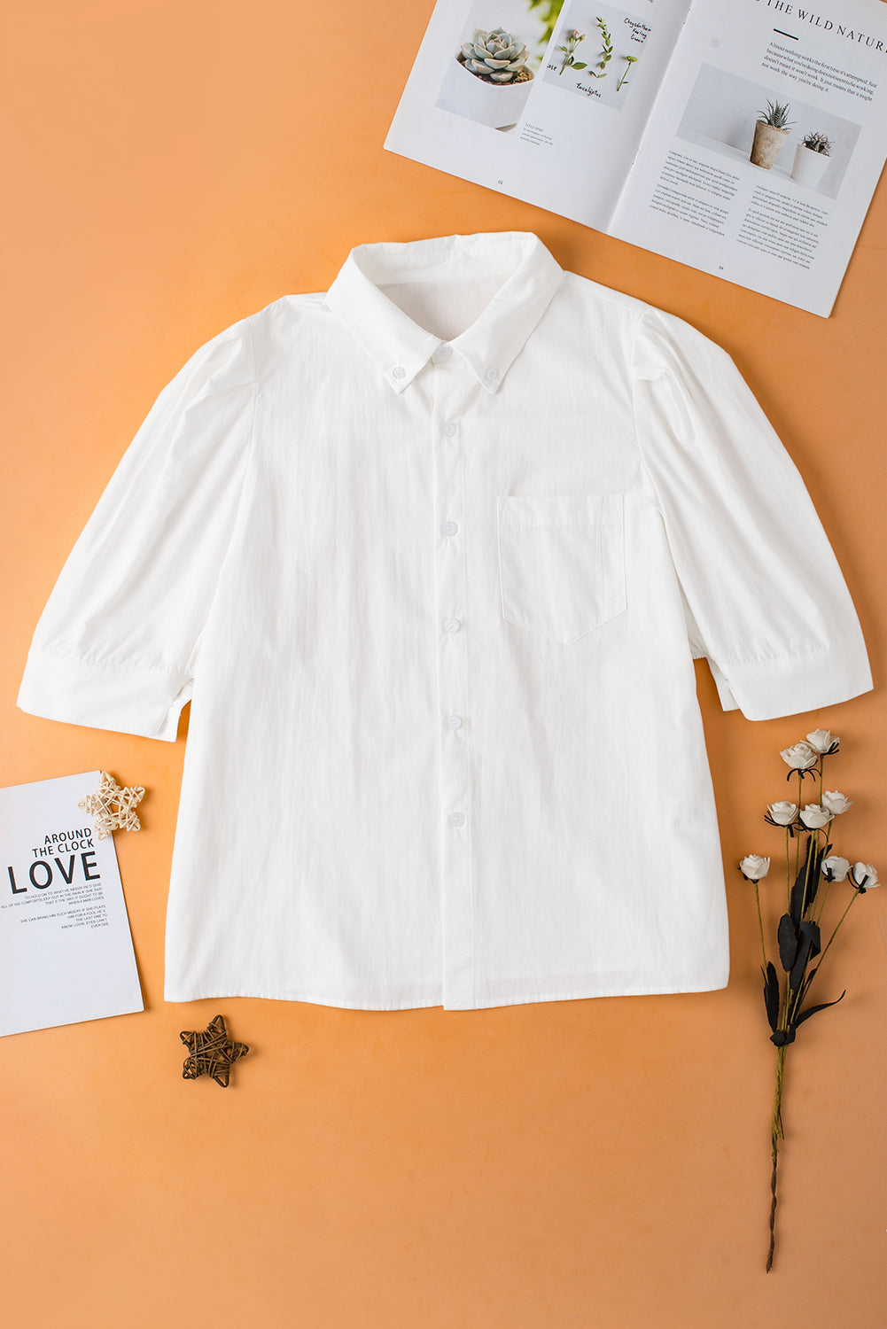 White Solid Color Button Up Puff Sleeve ShirtMaterial:100%Cotton



		Elevate your wardrobe with our shirt, crafted from a crisp and versatile fabric that offers a timeless appeal.
	
	
		This shirt feature