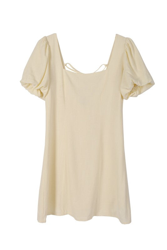 SS back strap dress - solid color*Scoop neck puff sleeve cream with back strap dress*Pattern type : solid*Neck line : square neck*Sleeve type : puff sleeves*Sleeve length : short sleeves*Stretch : n