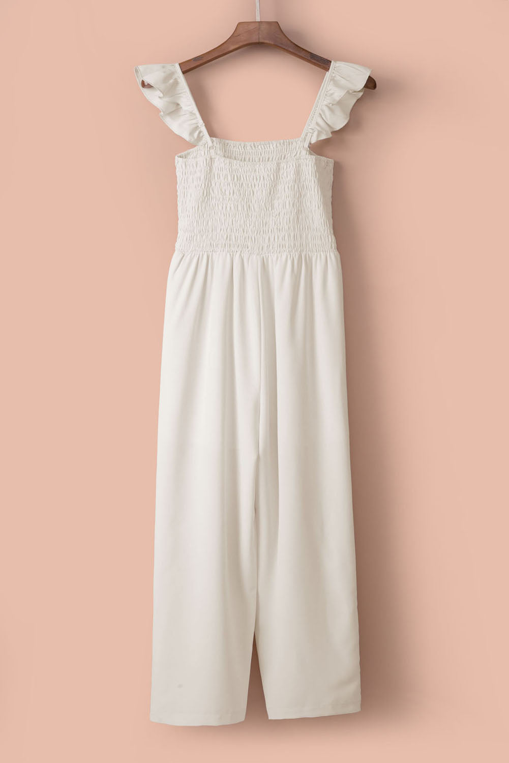 Apricot Smocked Ruffle Strap Pocket Wide Leg JumpsuitMaterial:100%Polyester



		This plain jumpsuit is sexy yet graceful with a flattering silhouette
	
	
		Flutter sleeves, square neck, smocked bodice and wide le