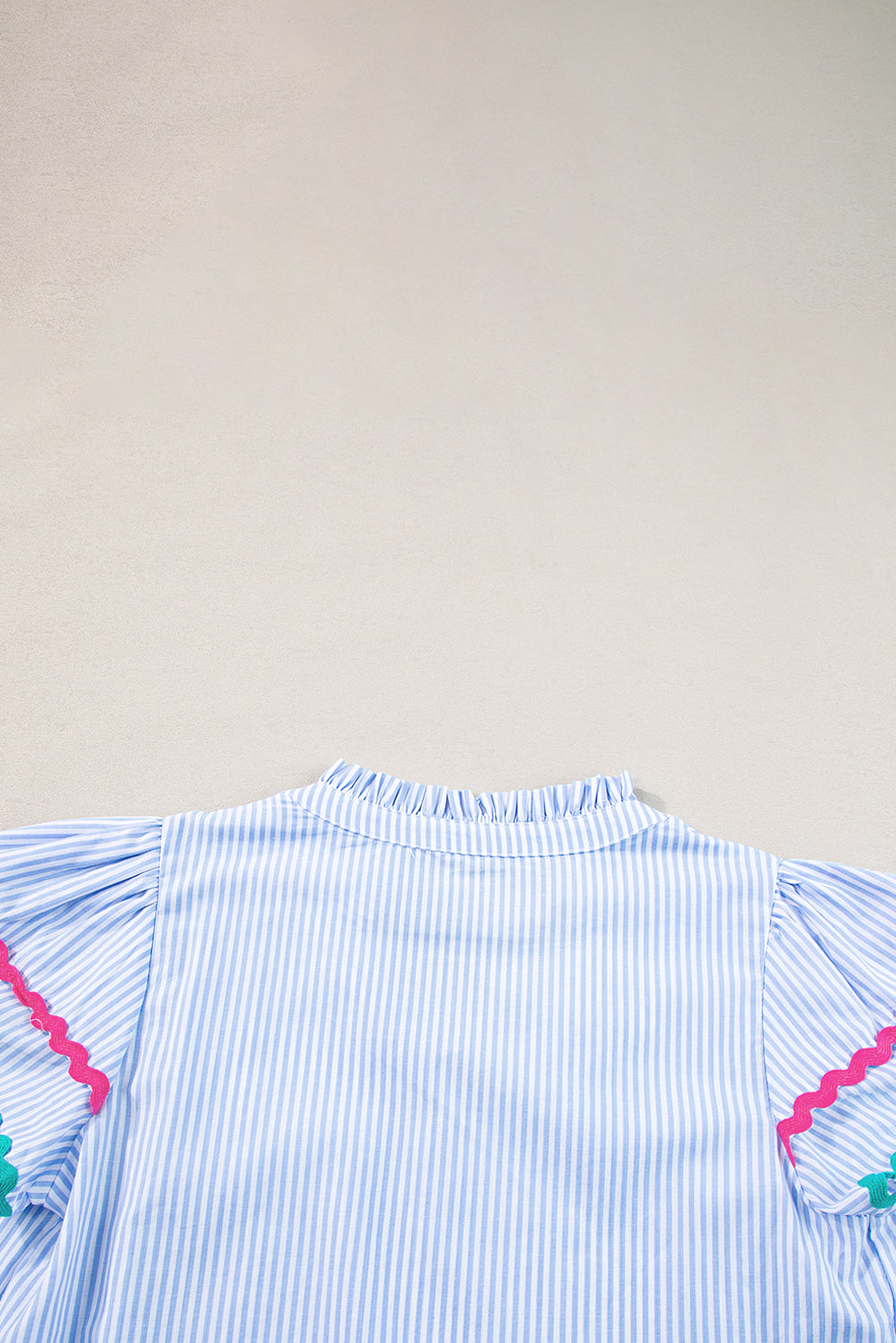 Sky Blue Striped Ricrac Splicing Frill V-Neck BlouseMaterial:100%Cotton



		Playful stripes: This blouse features a fun striped pattern with flirty frill details and a flattering V-neck.
	
	
		Chic and charming: