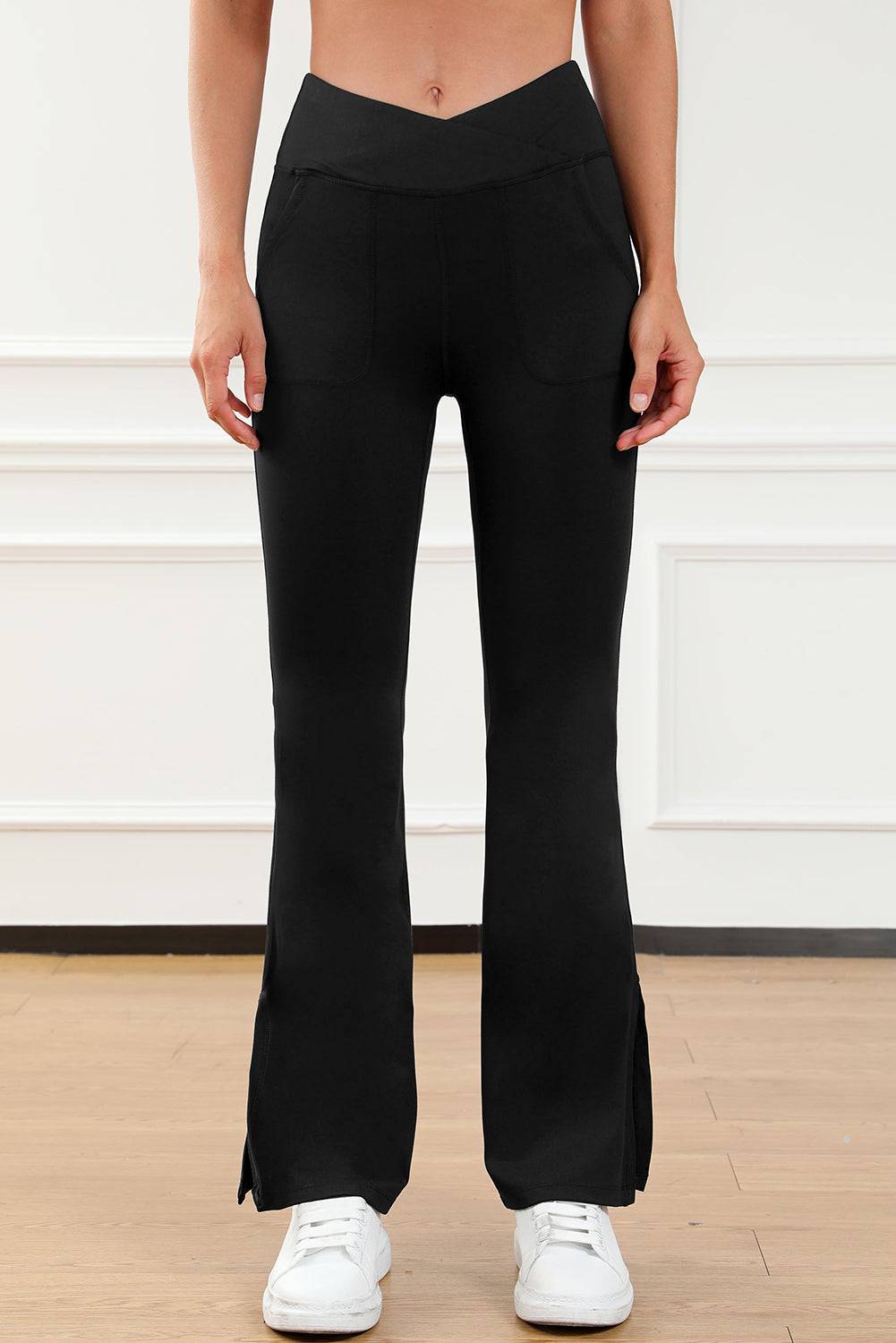 Black Cross Waist Pocketed Split Hem Flared LeggingsMaterial:75%Polyamide+25%Elastane



		Elevate your everyday look with these stylish pants made from soft, high-quality material that offers a comfortable stretch 