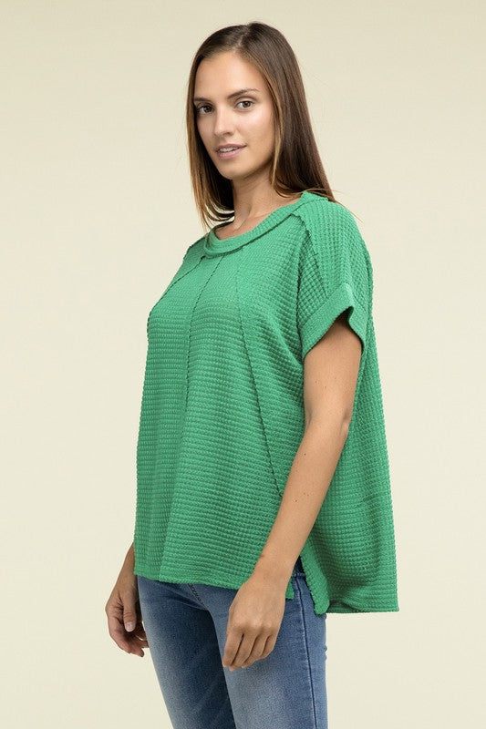 Brushed Waffle Exposed-Seam Short Sleeve TopElevate your casual wardrobe with this Brushed Waffle Top, featuring side slits, exposed seam details, and a stylish hi-low hem. Perfect for a relaxed yet trendy loo