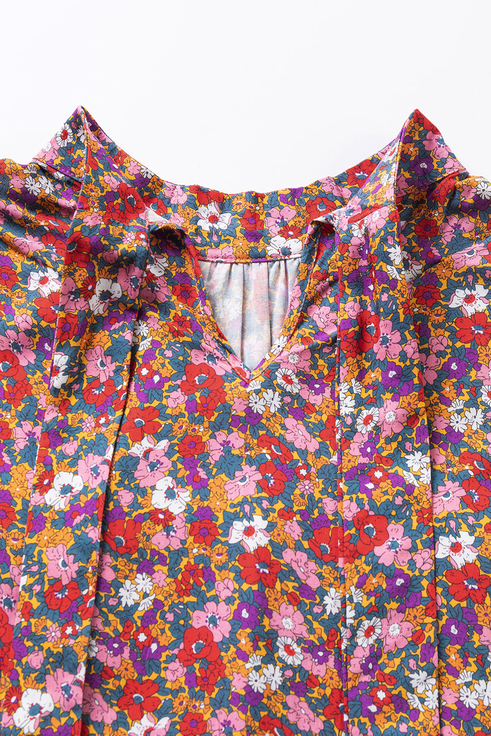 Purple Boho Floral Print Mock Neck Puff Sleeve BlouseMaterial:100%Viscose



		The blouse features a beautiful floral print that exudes a bohemian vibe. The intricate and vibrant patterns add a touch of femininity an