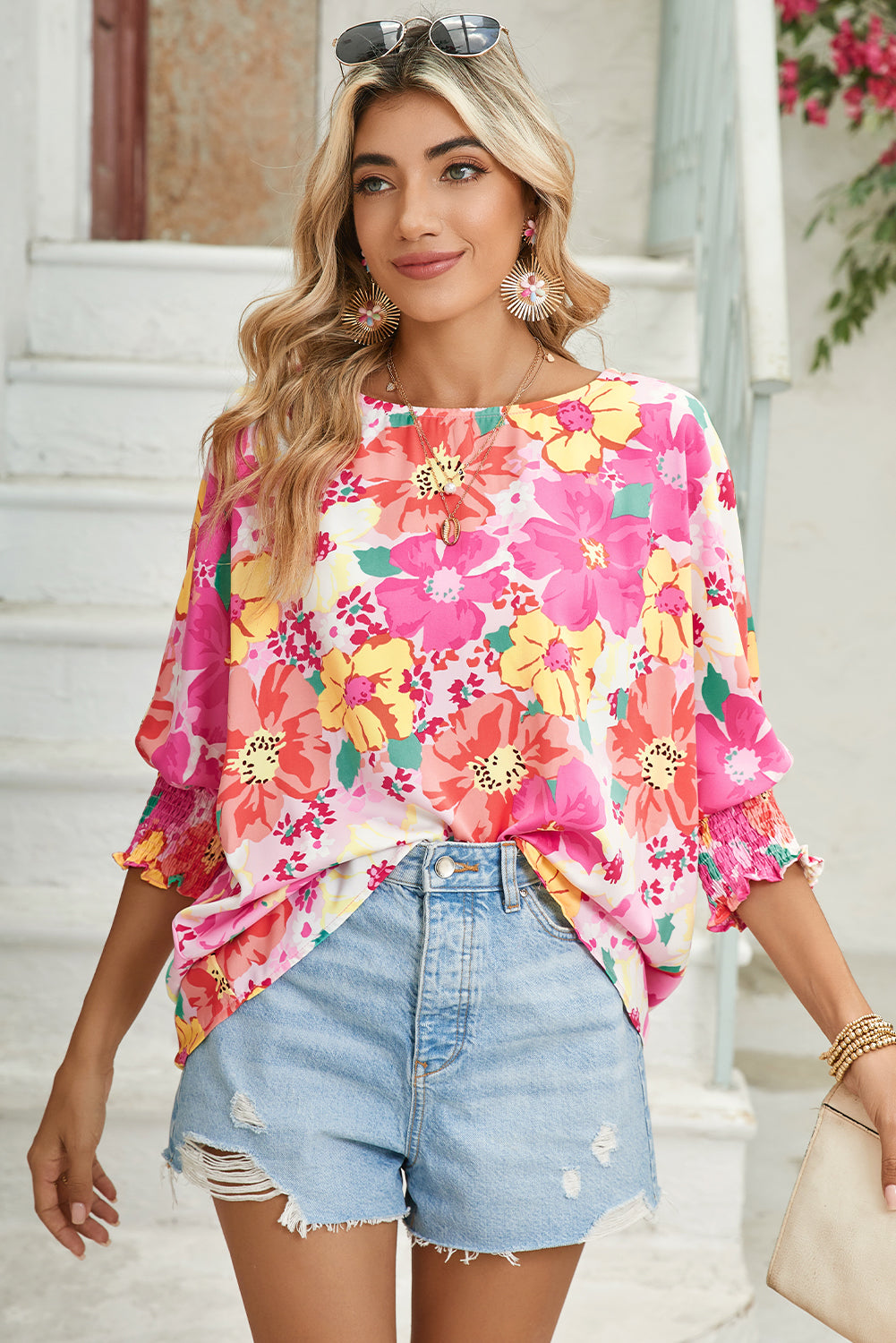 Pink Shirred Cuffs 3/4 Sleeve Boho Floral BlouseMaterial:100%Polyester



		The blouse is a stylish and feminine top featuring shirred cuffs and a boho-inspired floral print, adding a touch of bohemian charm to 