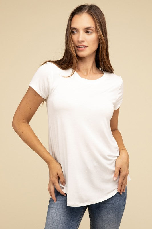 Flowy Round Hem Rayon Short Sleeve TopThe Flowy Round Hem Rayon Short Sleeve Top is the perfect addition to your casual wardrobe. Crafted from soft, lightweight rayon, this top features a relaxed fit and