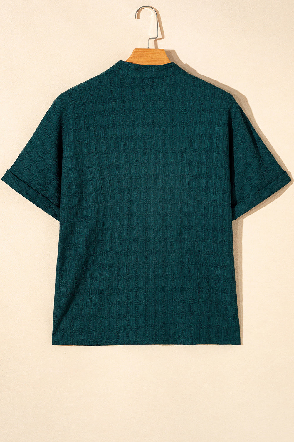 Sea Green Textured Split V-Neck Short Sleeve BlouseWith its flattering split V-neckline, this blouse adds a touch of elegance and sophistication to any outfit.
	
	
		The short sleeves provide a comfortable and bre