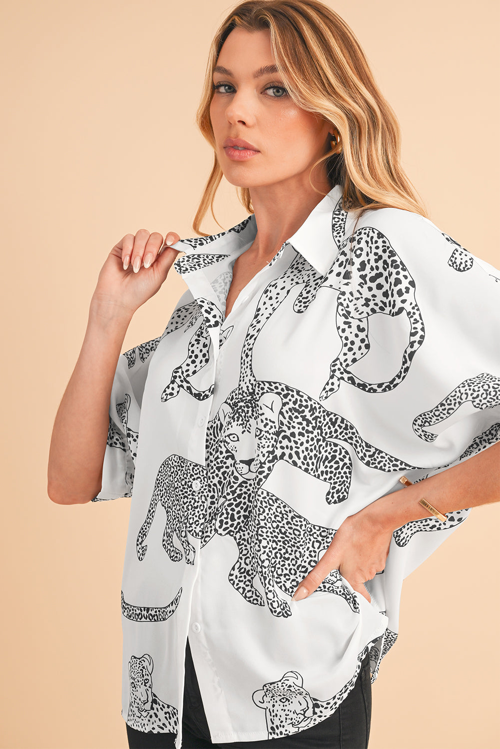 Beige Cheetah Print Buttoned Half Sleeve BlouseMaterial:100%Polyester



		The blouse features a trendy and eye-catching cheetah print pattern, adding a bold and stylish touch to your outfit.
	
	
		Made from