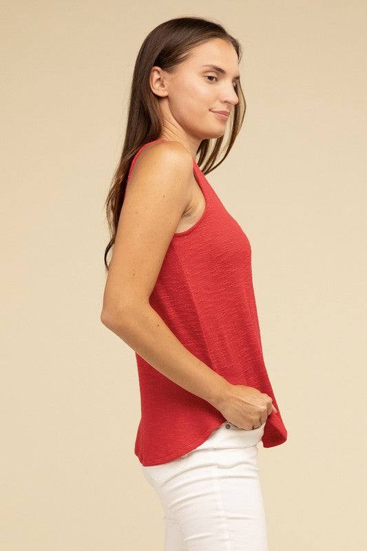 V Neck Sleeveless Cami TopThe V Neck Sleeveless Cami Top is a chic and versatile addition to any wardrobe. Featuring a flattering V neckline and a sleeveless design, this cami top is perfect 