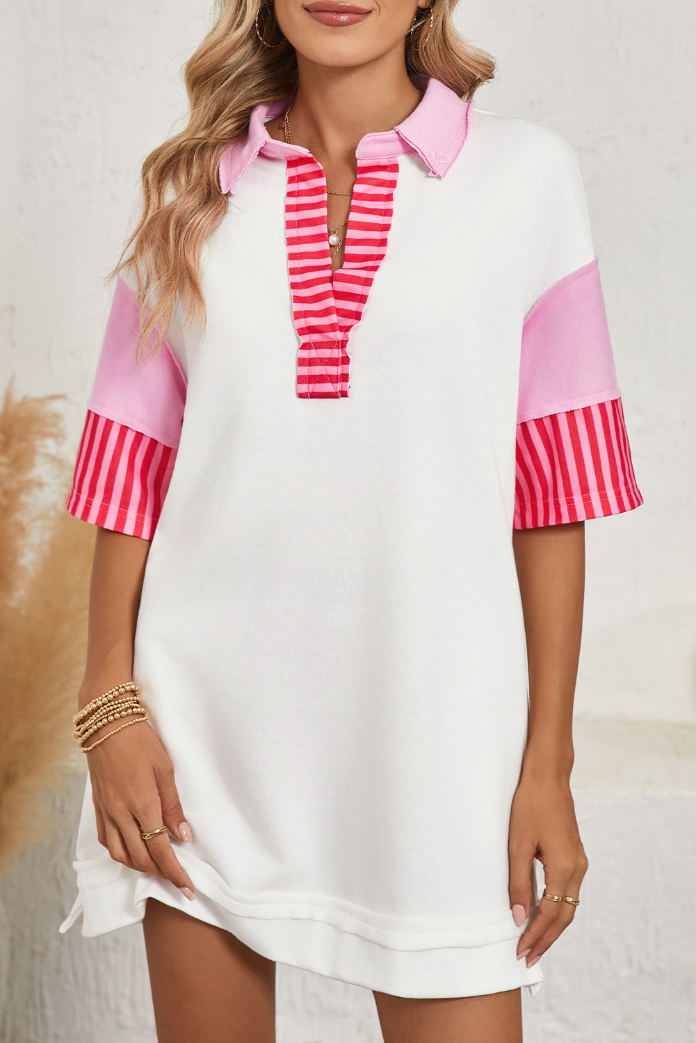 Pink Stripe Colorblock Sleeve Collared Mini DressMaterial:65%Polyester+35%Cotton

• The combination of pink and stripes adds a fun and trendy touch to your outfit.
• Embrace the relaxed vibes with the drop sleeve