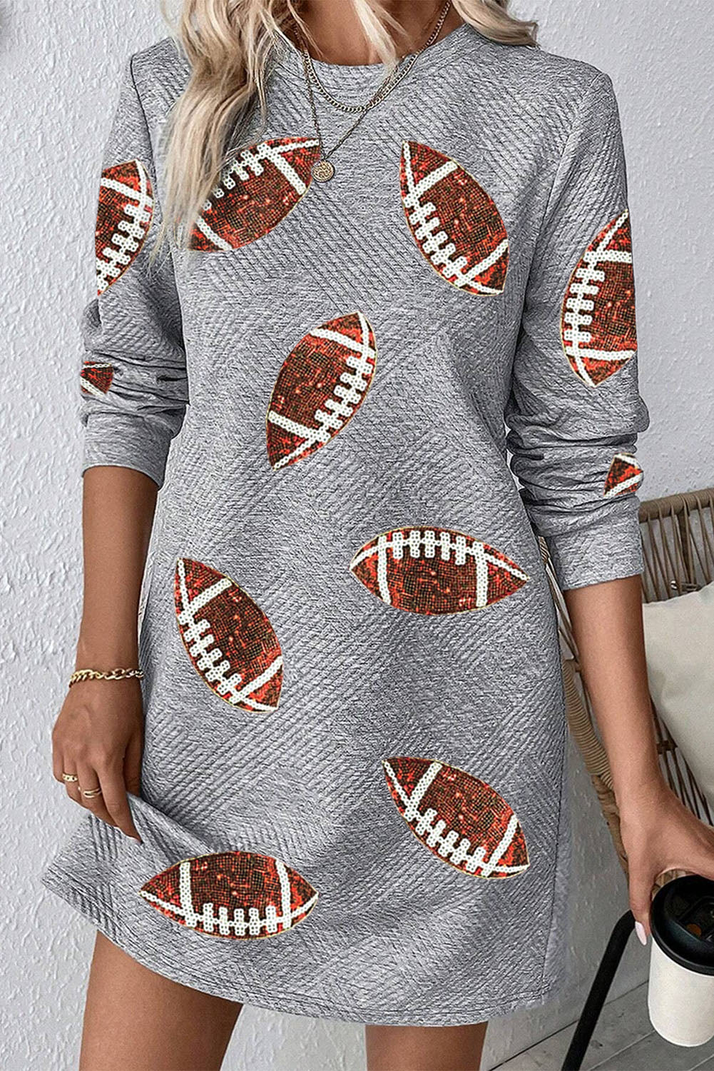 Gray Sequin Rugby Graphic Round Neck Textured Mini DressMaterial:97%Polyester+3%Elastane

• Shimmer and shine in the dress, perfect for adding a touch of glamour to your wardrobe. 
• With its long sleeves and round neck